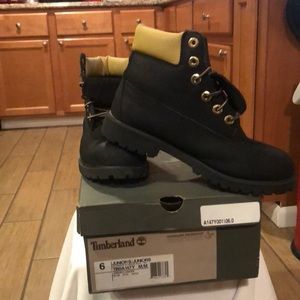 Timberlands black and gold